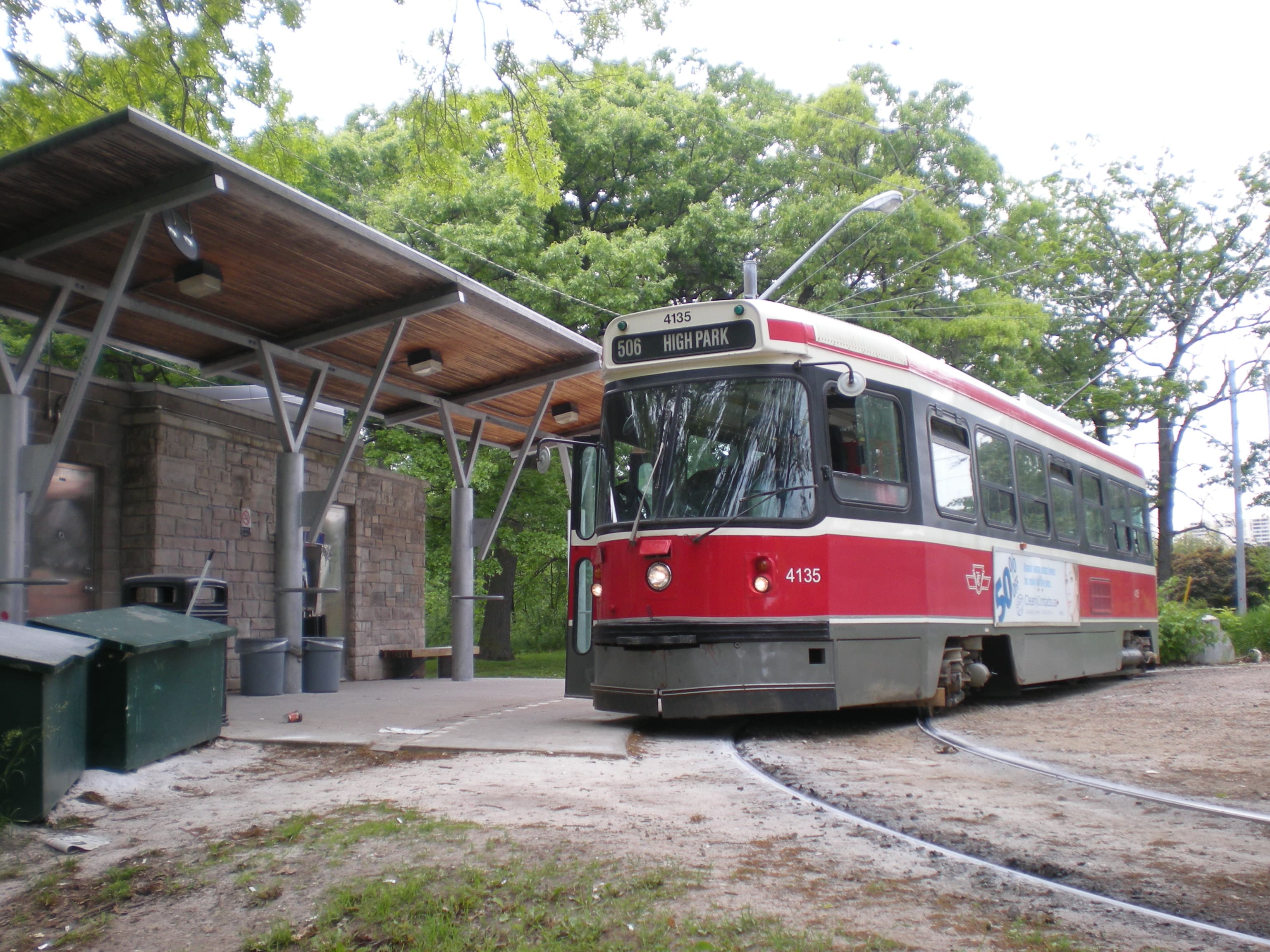 A red TTC streetcar at the High Park loop in Toronto
